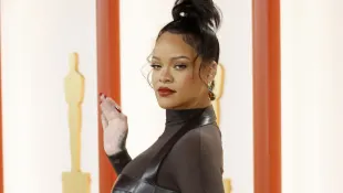 Rihanna shows off her baby bump at Oscars 2023