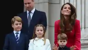 Queen Elizabeth II, accompanied by The Prince of Wales and The Duchess of Cornwall, The Duke and Duchess of Cambridge an