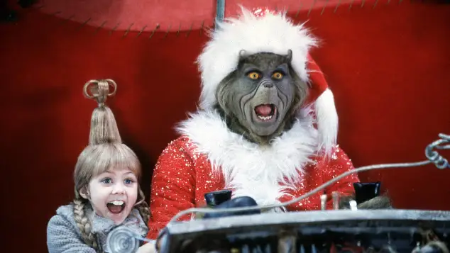 Taylor Momsen und Jim Carrey in „Der Grinch“