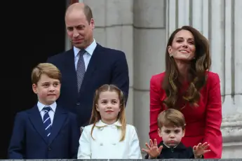 Queen Elizabeth II, accompanied by The Prince of Wales and The Duchess of Cornwall, The Duke and Duchess of Cambridge an