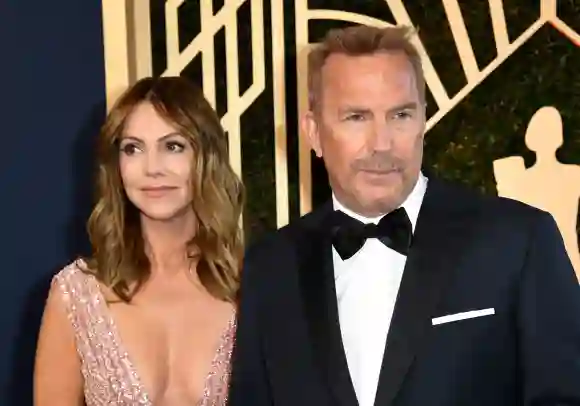 Kevin Costner und Christine Baumgartner