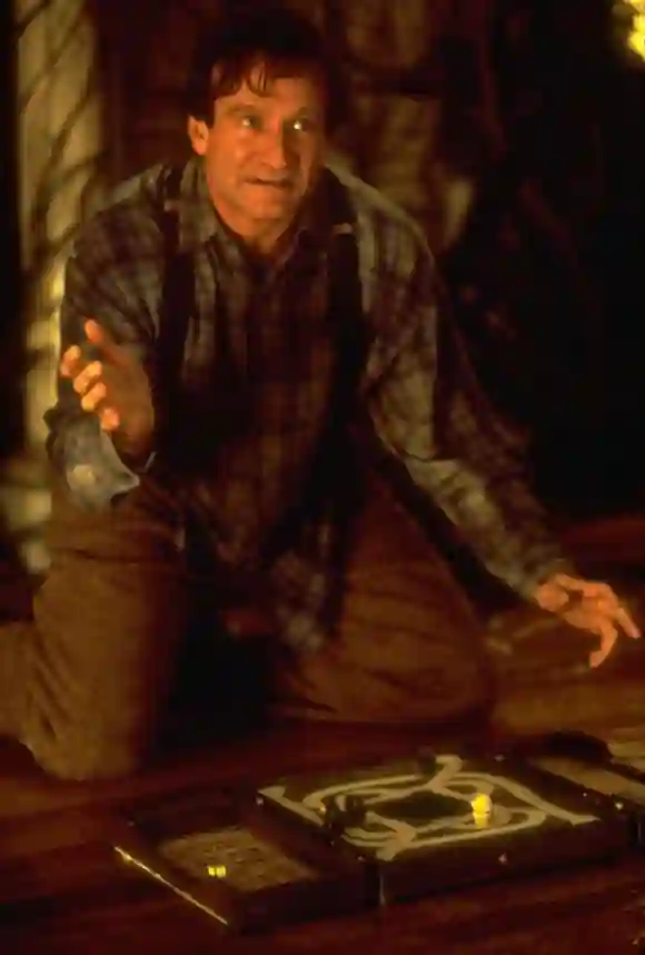 Robin Williams alias "Alan Parrish" das Spiel "Jumanji" bis zum Ende durchspielen.